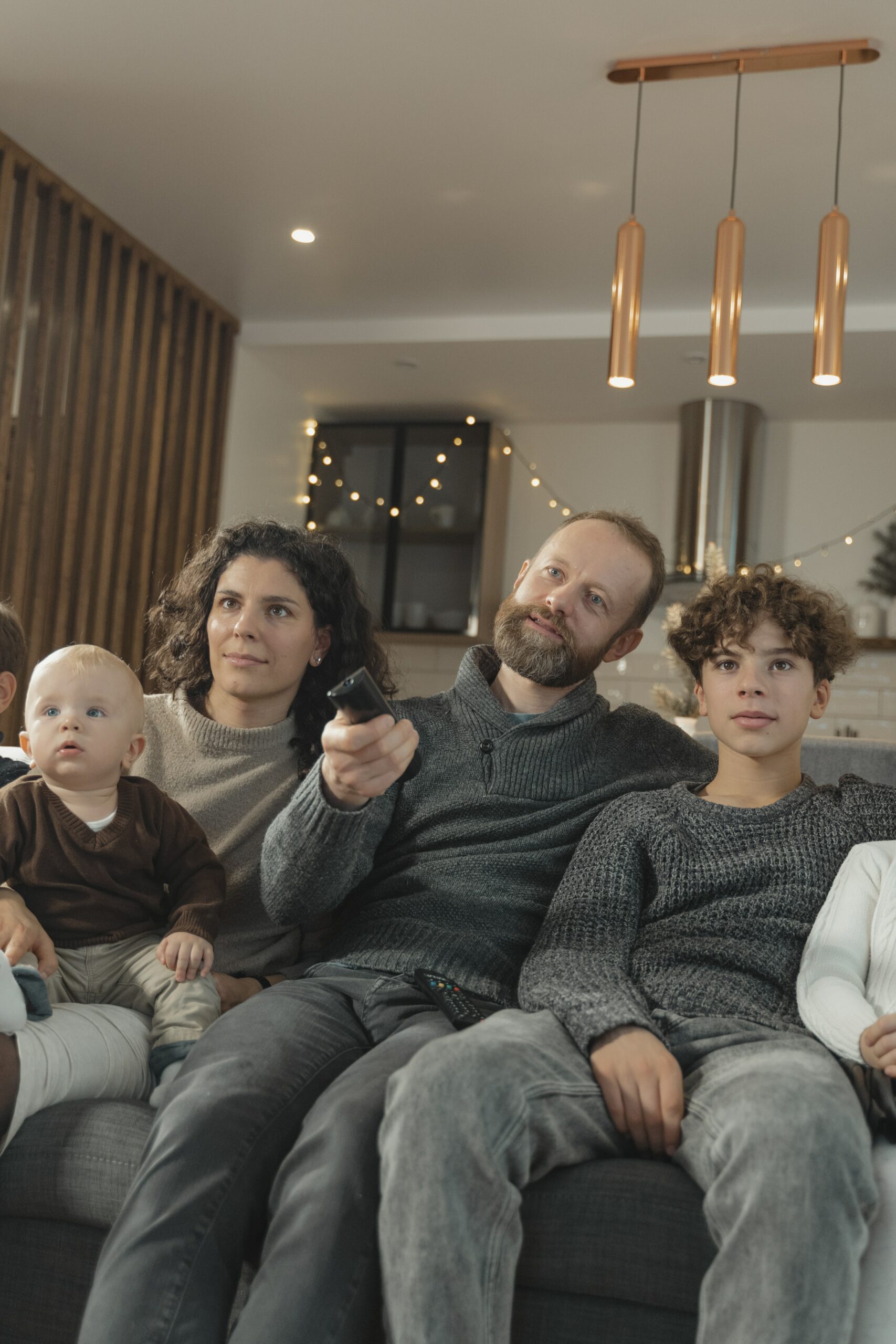 Family photo sitting on the sofa.